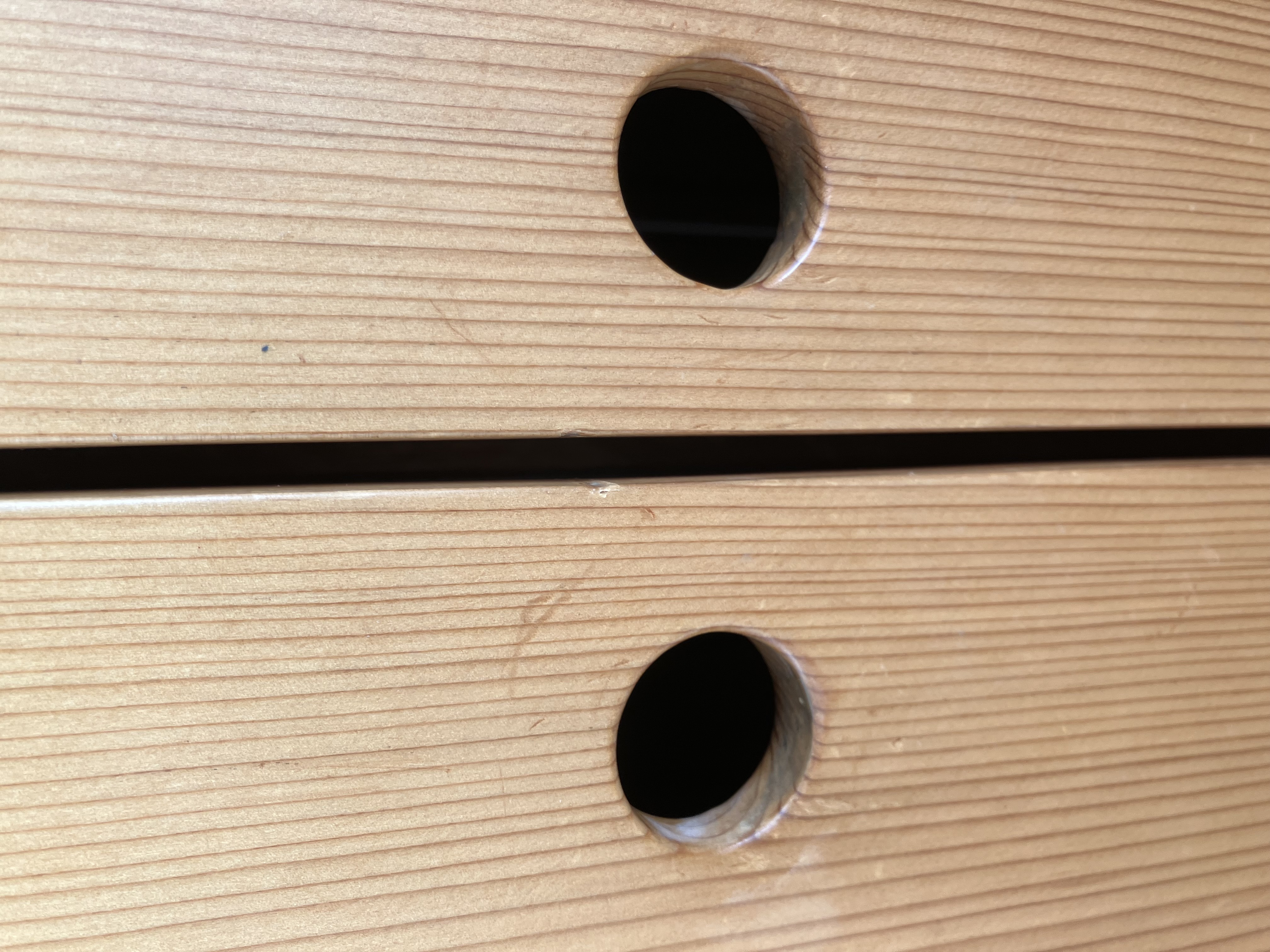 ‘two cabinet doors with holes drilled for handles’